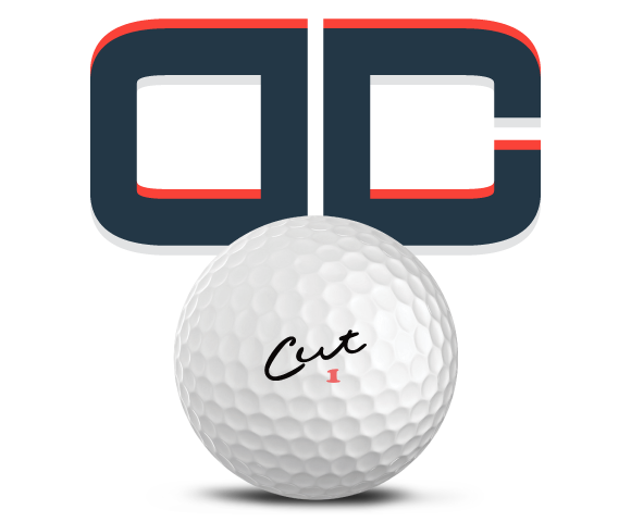 Cut DC Golf Ball With a DC Logo Behind It