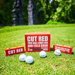 Cut Red Boxes of Sleeves and Dozen With Balls in Front On Tee Box