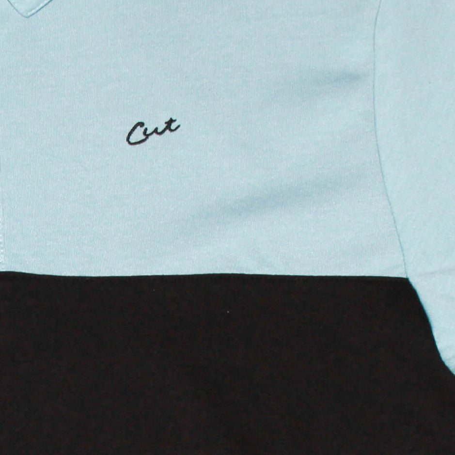 Cut Golf Logo Closeup on the Logan Black Polo Shirt