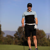 Golfer Wearing a Cut Golf Logan Black Polo Shirt