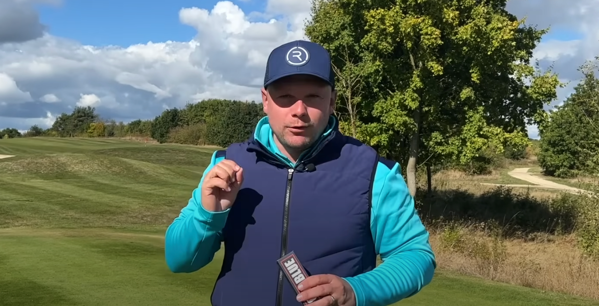 Video Image of James Robinson Reviewing the Cut Blue Ball