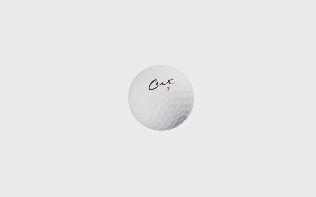 Cut Blue Golf Ball On a White Background