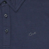 Cut Golf Logo Closeup on the Logan Navy Polo Shirt