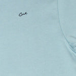 Cut Golf Logo Closeup on the Game Day Pale Blue Polo Shirt