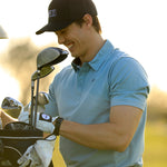 Golfer Tom Carey Smiling Wearing the Cut Golf Game Day Pale Blue Polo Shirt