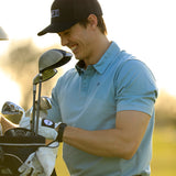 Golfer Tom Carey Smiling Wearing the Cut Golf Game Day Pale Blue Polo Shirt